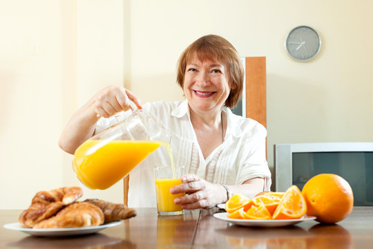 Mature  Woman Having Breakfast