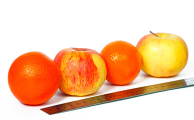 Oranges and apples in a row and ruler