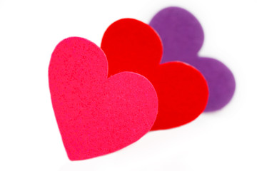 Three colored heart shapes