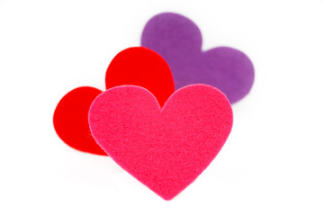 Three colored heart shapes