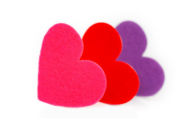 Obraz premium Three colored heart shapes