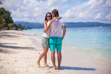 Young couple enjoying each other on exotic beach