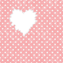 Hole in heart shape on Polka dot background