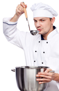 man cook holding saucepan and ladle