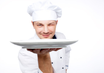 chef holding empty plate