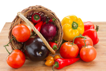 pile   of raw  vegetables in wicker basket