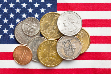 U.S. coins on American Flag