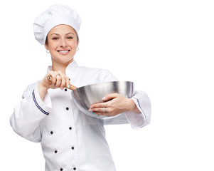 Female chef with whisk