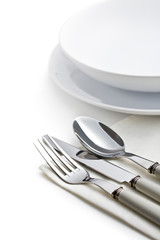 silver cutlery and plates