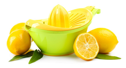 Citrus press and lemons isolated on white