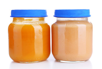 Baby food in glass jars, isolated on white