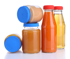 Baby food in glass jars, isolated on white