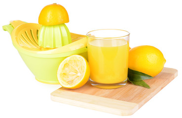 Citrus press and lemons isolated on white
