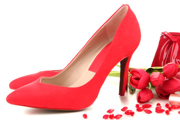 Beautiful red female shoes, isolated on white