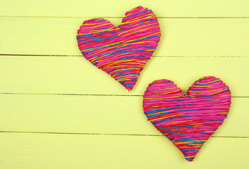 Decorative heart on wooden background