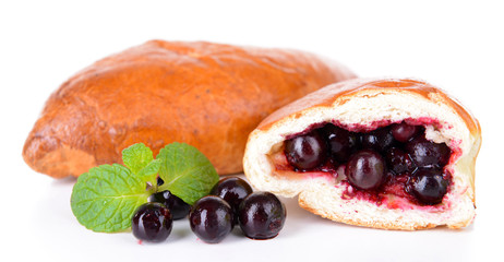 Fresh baked pasties with currant isolated on white