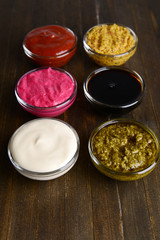 Various sauces on table close-up