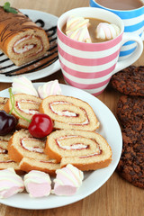 Cup of cappuccino and sweets close up