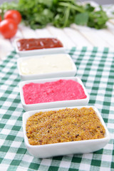 Various sauces on table close-up