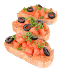 Delicious bruschetta with tomatoes isolated on white