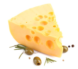 Piece of cheese with green olives, isolated on white