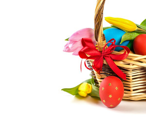 Easter basket with Easter Eggs and tulips