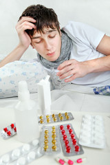 Obraz na płótnie Canvas Sick Young Man with Flu