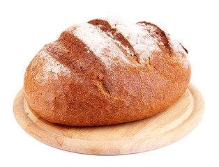 Rye bread on wooden stand isolated on white
