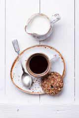 Сup of coffee espresso with oatmeal cookies.