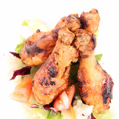 Fried chicken legs with side salad