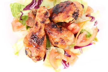 Fried chicken legs with side salad