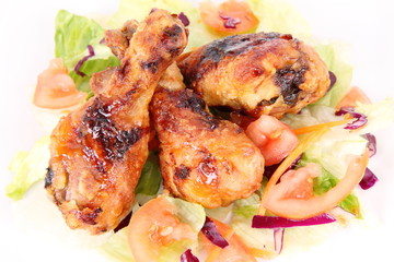 Fried chicken legs with side salad