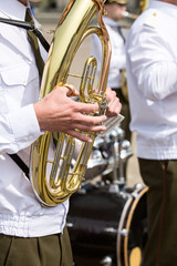Obraz na płótnie Canvas Tuba player in military band