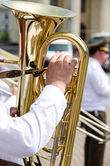 Musician carrying his tuba