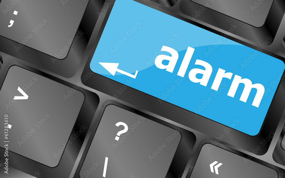 Poster alarm button on a black computer keyboard