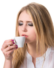 Beautiful girl enjoying coffee