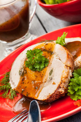 Sliced pork lion roll stuffed with mushrooms
