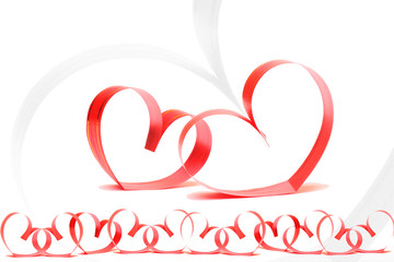 Ribbons shaped as hearts on white, valentines day concept