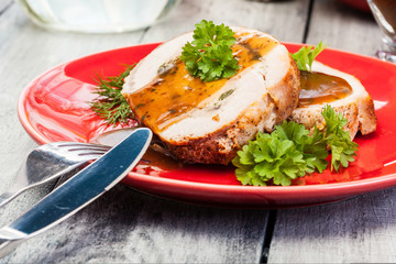Sliced pork lion roll stuffed with mushrooms