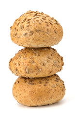 Round sandwich bun with sunflower seeds isolated on white backgr