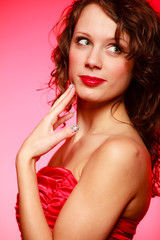 Romantic woman girl in red dress on pink. Valentines Day.