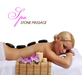 Spa Stone Massage. Beautiful Blonde Getting Hot Stones Massage