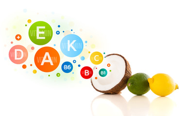 Healthy fruits with colorful vitamin symbols and icons