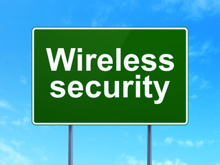 Security concept: Wireless Security on road sign background