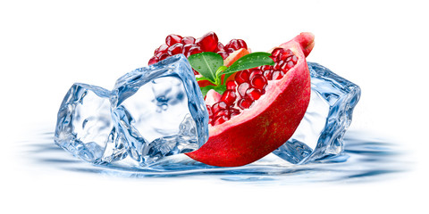 Pomegranate. Fruit with ice isolated on white background