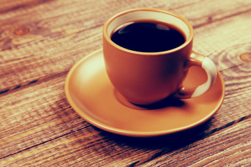 Coffee cup on a wooden table