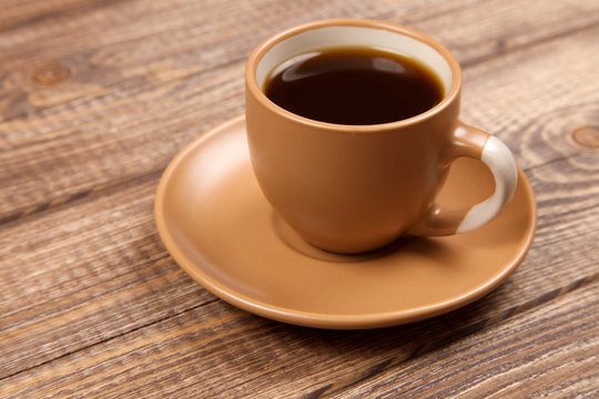 Coffee cup on a wooden table