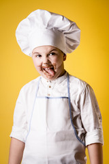 Little boy chef in uniform