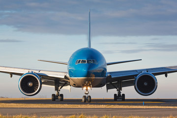 Eye to eye view with huge taxiing plane