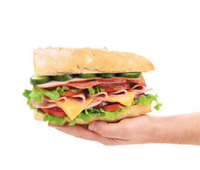 French baguette sandwich in hand.